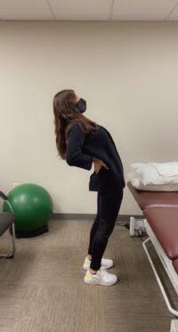 Standing backbend to relieve back tightness from sitting