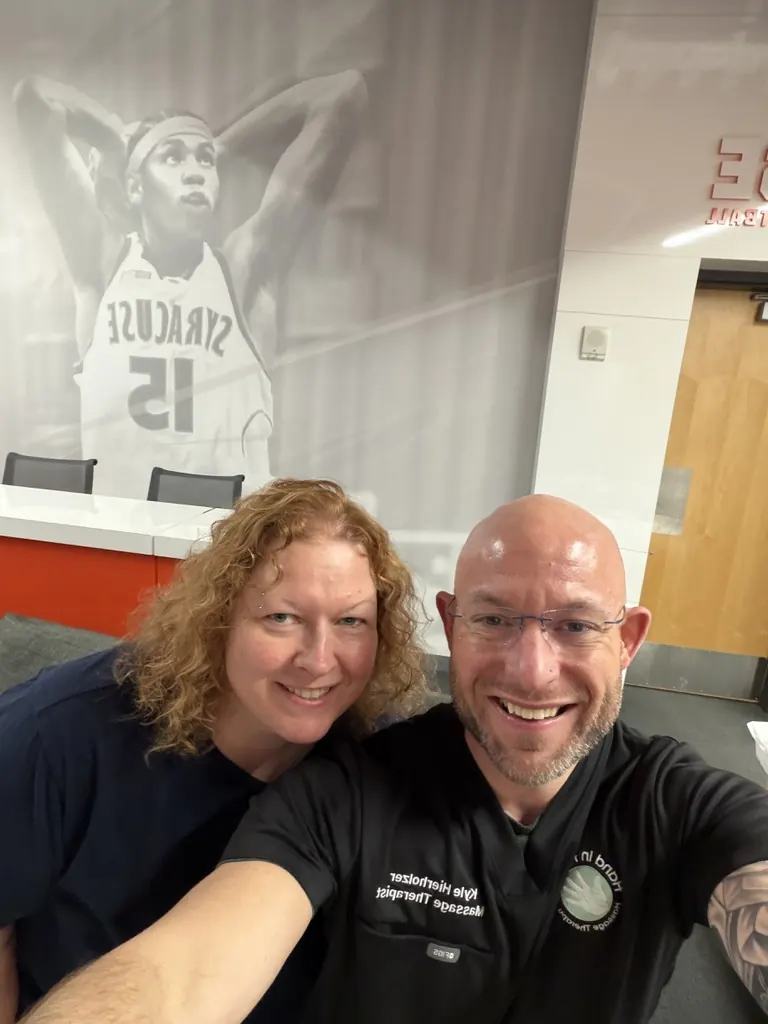 Hand in Health massage therapists at Syracuse University Athletics
