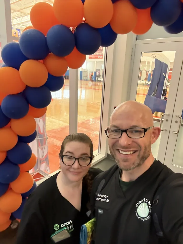 Hand in Health massage therapists at a Syracuse University event